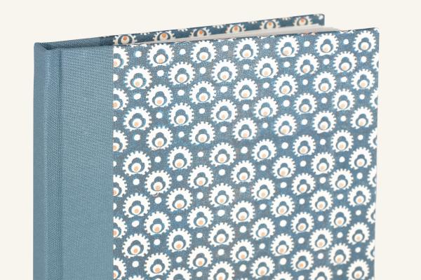 blue linen spine, cover paper blue and white with geometic pattern
